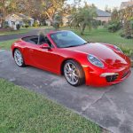 Pete's Porsche parked outside for Google review.
