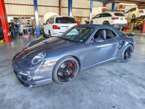 Porsche 997 911 Turbo parked inside Eurospec Autowerks.