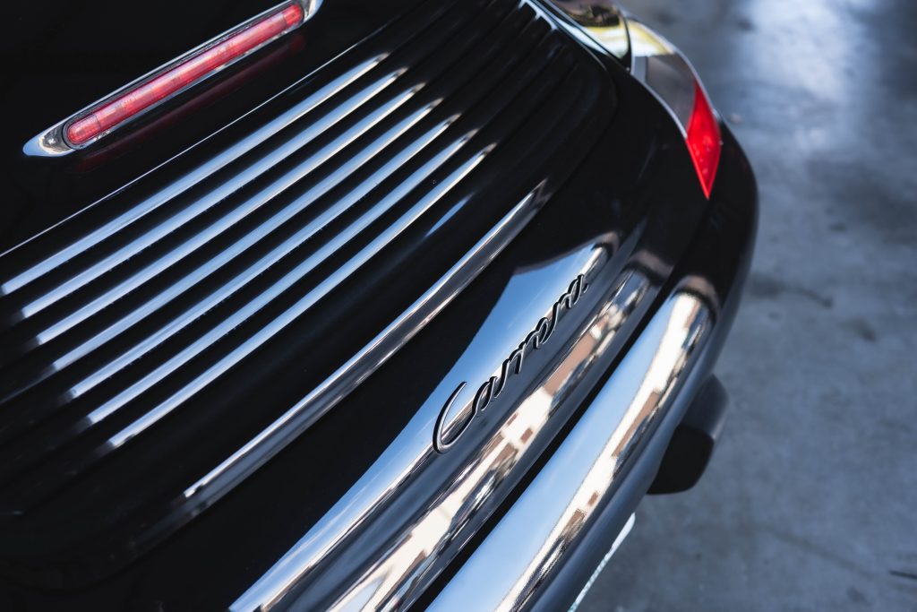 Porsche 911 Carrera parked in the shop.