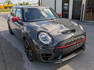 Mini Cooper JCW Clubman parked in front of Eurospec Autowerks.