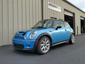 Mini Cooper S R53 parked in front of Eurospec Autowerks.