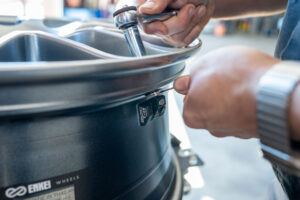 TPM getting tightened down and installed on brand new Enkei wheel.